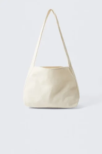 Blød skuldertaske i canvas – lys beige