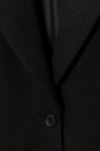Lang, enkeltsidet frakke i slim fit – sort