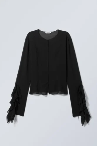 Langærmet bluse med flæser – sort