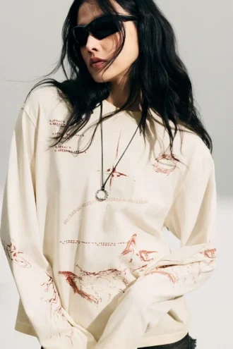 Langærmet top med print i boxy-pasform – lys beige – Street Print