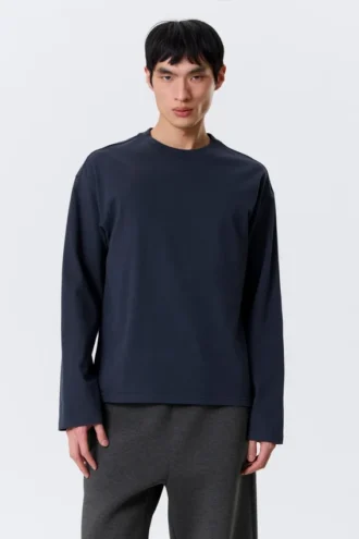 Løs, kasseformet T-shirt med lange ærmer – mørk marineblå