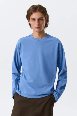 Løs, kasseformet t-shirt med lange ærmer – vasket blå